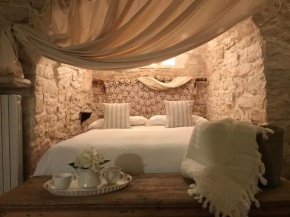 Гостиница Trulli Aria di Casa  Альберобелло